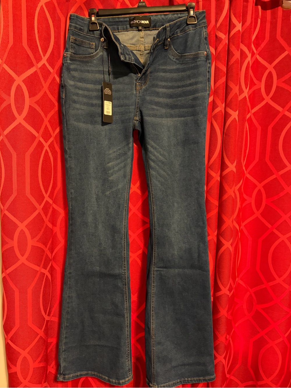 Fashion Nova Dark Blue Flared Jeans size is a 9 not 10